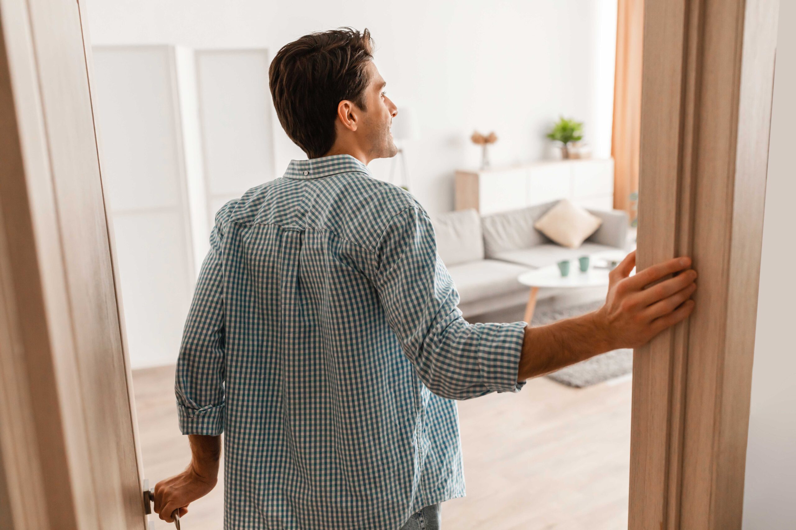 A Man Looking Around His Custom Home